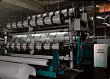 Double needle bed warp knitting machine