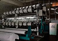 Double needle bed warp knitting machine