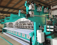 Oil-immersed tongue needle warp knitting machine