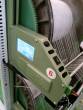 Automatic adjustment system of warp tension of textile equipment
